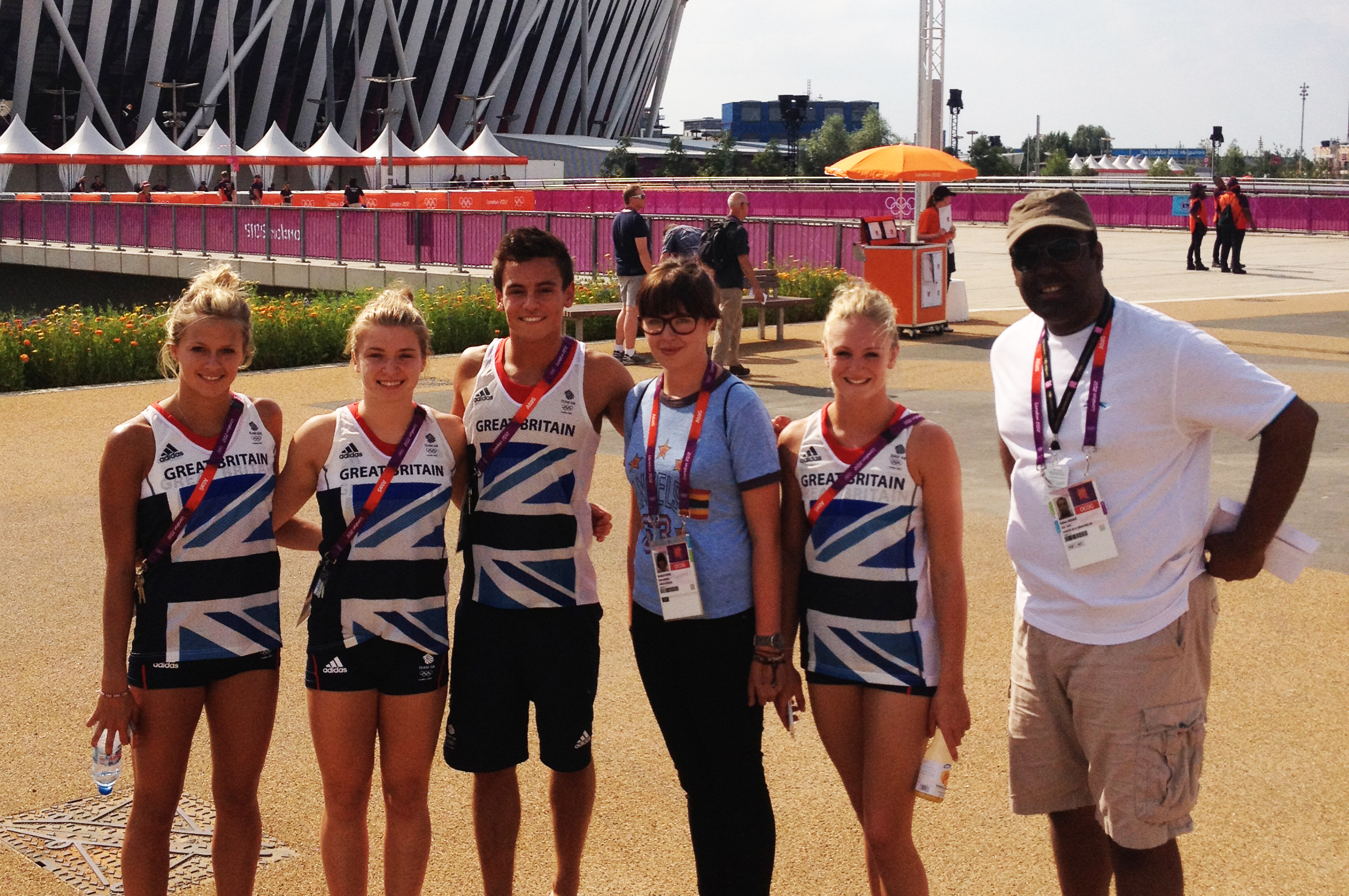 Volunteer Rahim Shamji with members of the British Olympic team. Shamji will be a drummer in the opening ceremony of the London 2012 Olympic Games. Photo: Courtesy of Rahim Shamji