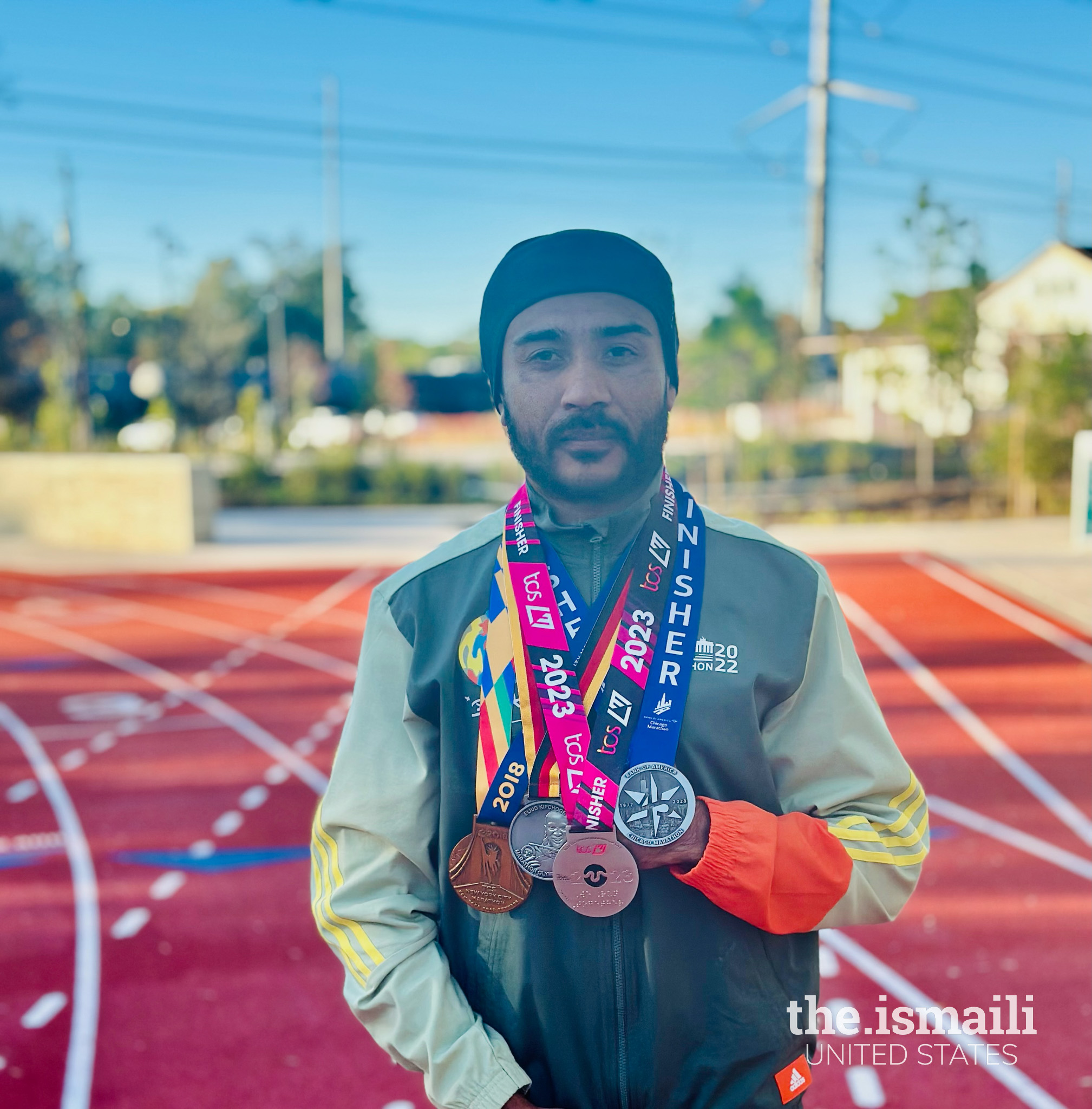 Track day with Nizar wearing major marathon medals. 