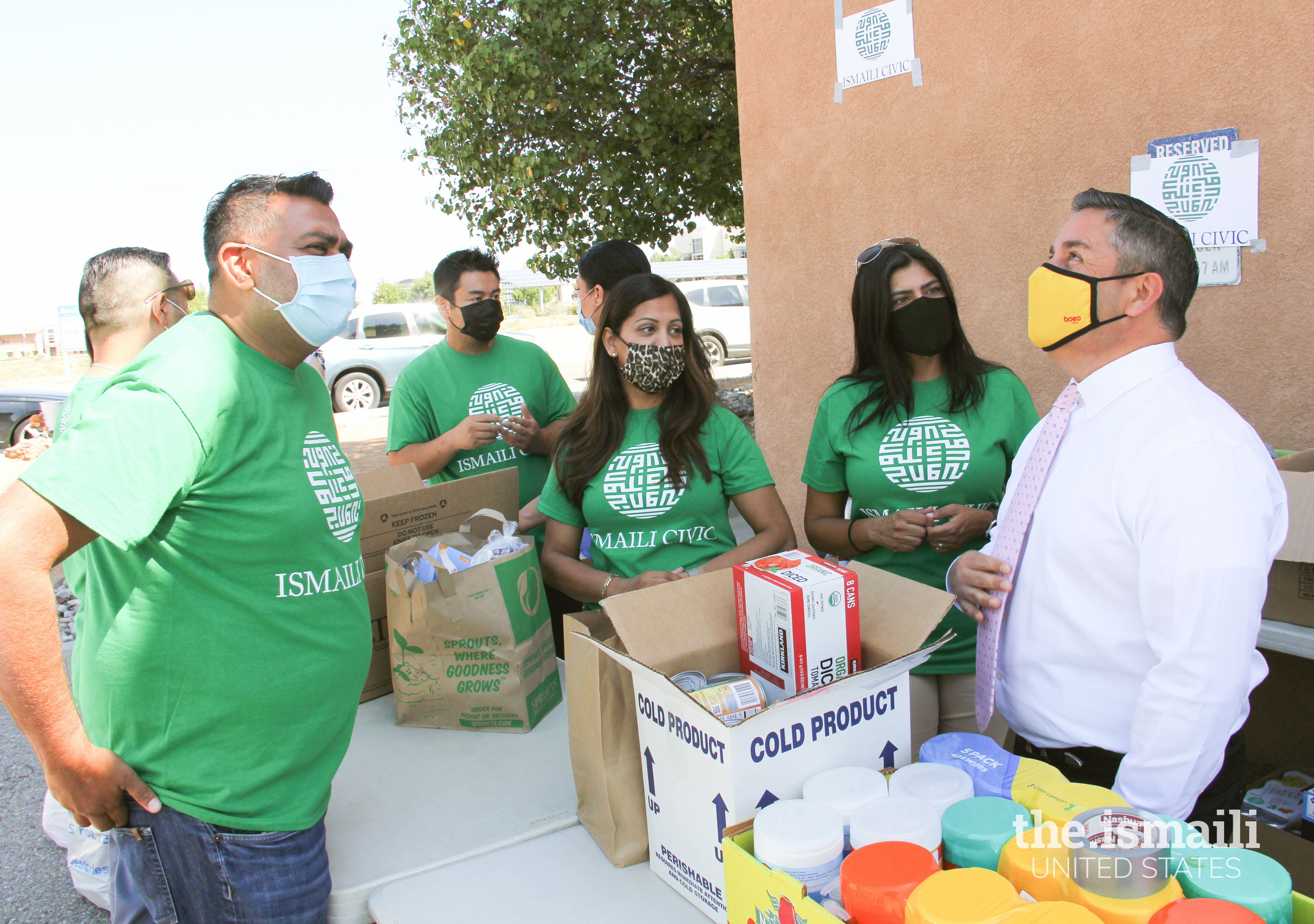 New Mexico Senator Ben Ray Lujan with Ismaili CIVIC volunteers at a supplies drive for Afghan refugees in Albuquerque.