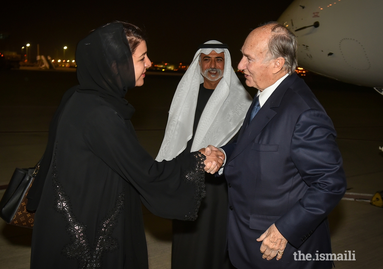 Mawlana Hazar Imam is welcomed by Her Excellency Reem Bint Ebrahim Al Hashimy, Cabinet Member and Minister of State for International Cooperation, and His Excellency Sheikh Nahayan Bin Mabarak Al Nahayan, Minister for Tolerance upon his arrival in Dubai.