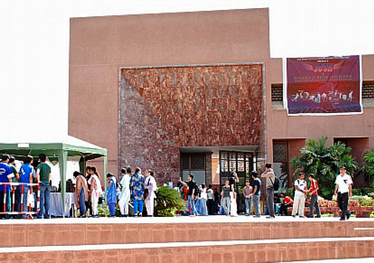 Athletes line-up to register at the Aga Khan University Sports Complex in Karachi.  