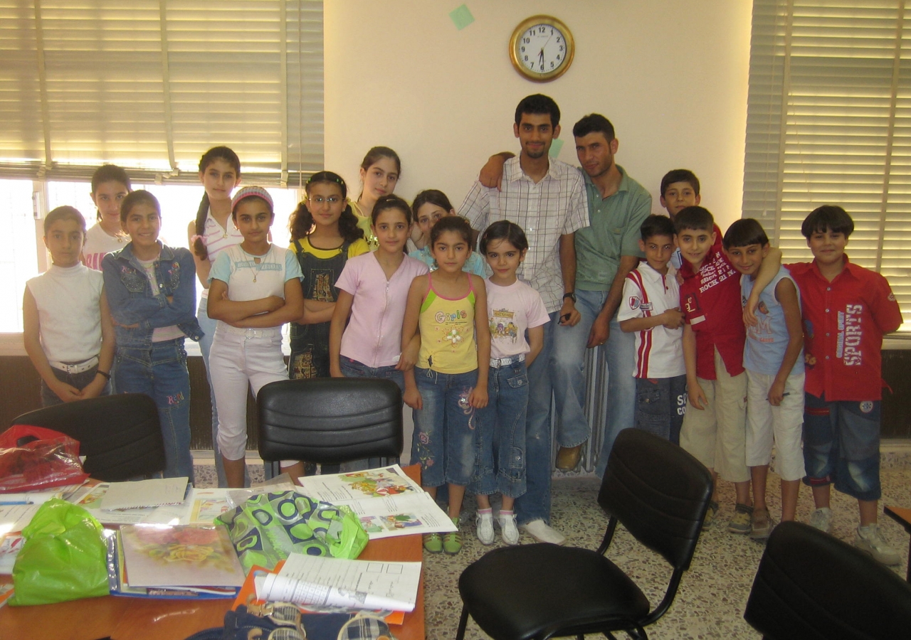 Sameer Kassam visits an English class at the Aga Khan Education Services building. 