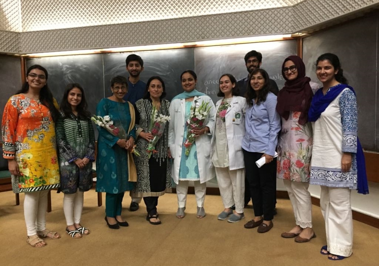 Dr Anees Chagpar (3rd from left) and Dr Farin Amersi (4th from left) pose for a photograph with AKU medical students.