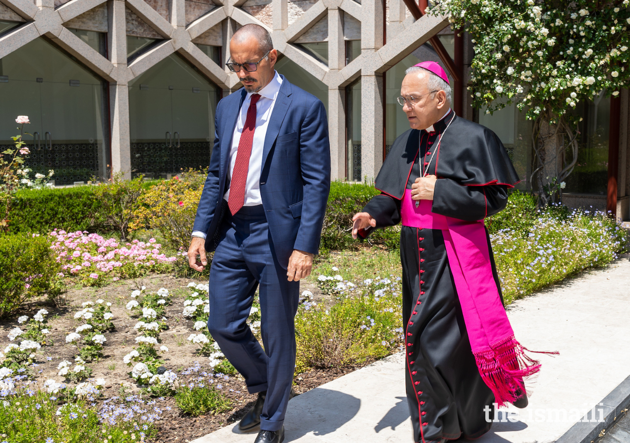 Prince Rahim and Monsignor Peña Parra walk through the courtyard garden at the Ismaili Centre, Lisbon.