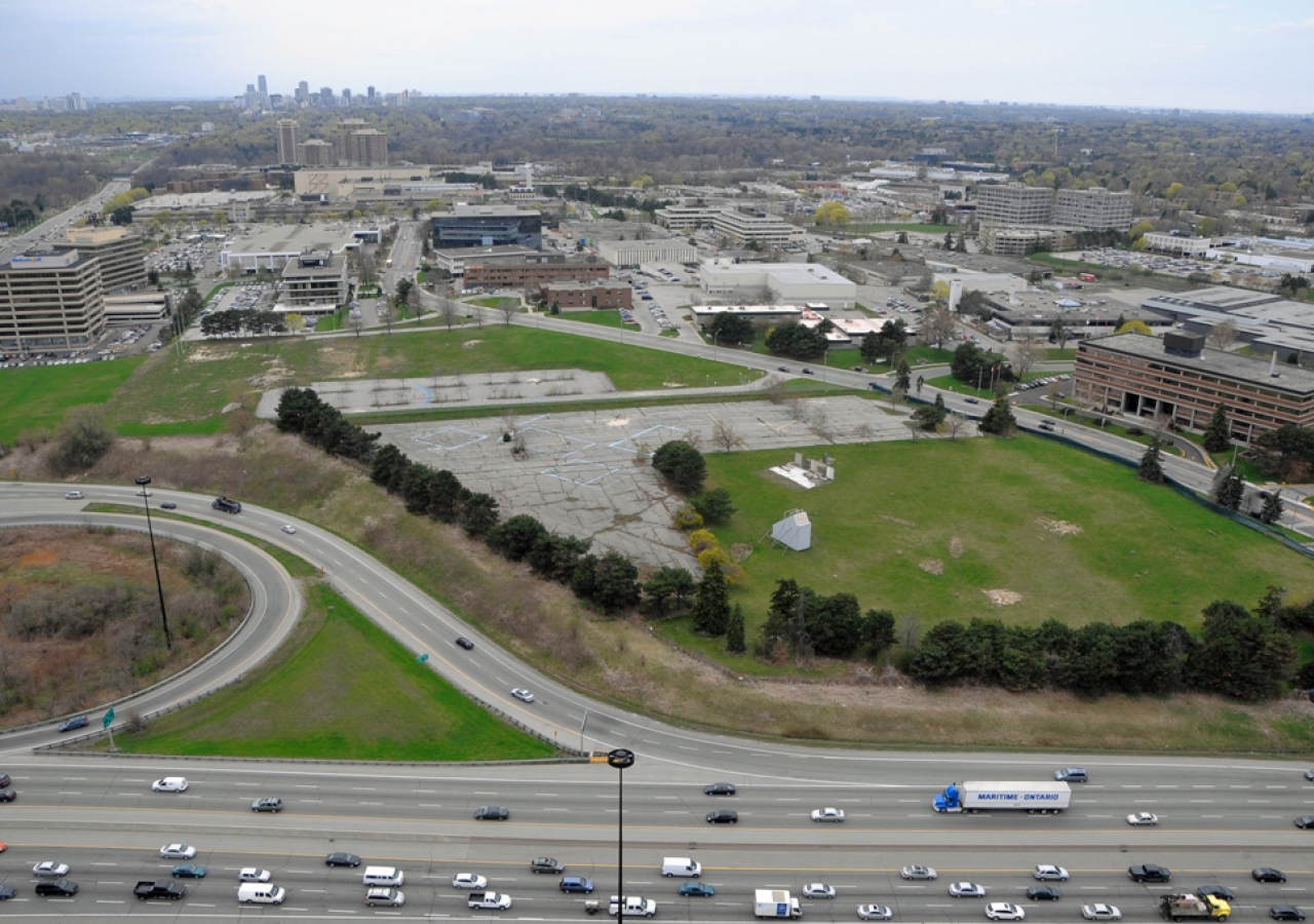 An aerial view of the Wynford Drive site, which is being developed into a park where the Ismaili Centre, Toronto and the Aga Khan Museum will be situated. The site is clearly visible from the adjacent Don Valley Parkway thoroughfare.