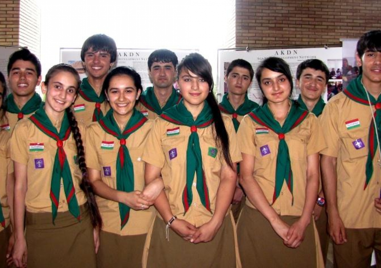 Tajik Ismaili Girl and Boy Scouts pose for a photo as they prepared for the arrival of guests at the Imamat Day reception.