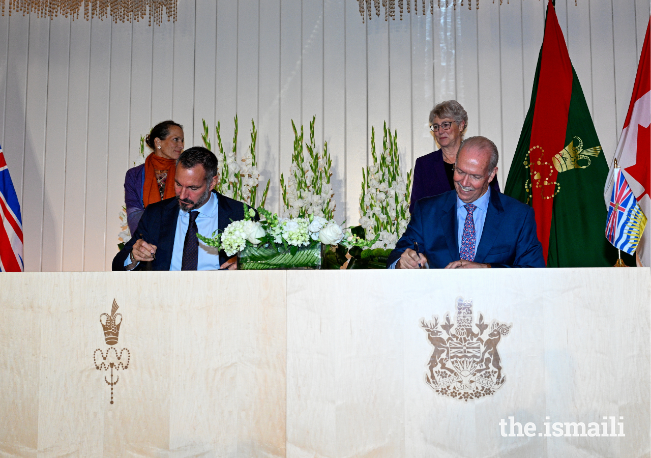 Prince Rahim and British Columbia Premier John Horgan sign an Agreement of Cooperation between the Ismaili Imamat and the Province of British Columbia on 29 September 2022.