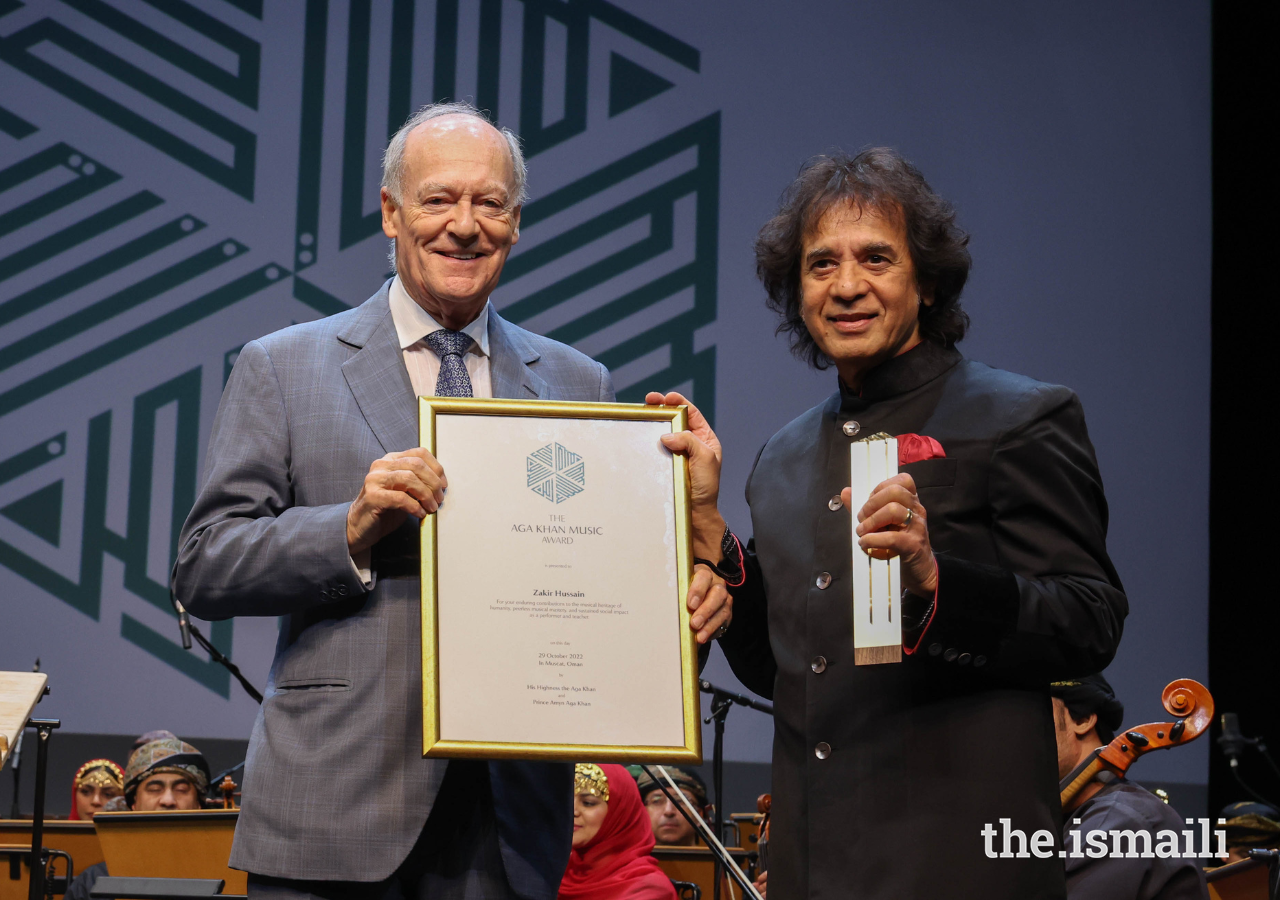 Prince Amyn presents the 2022 Aga Khan Music Award for Lifetime Achievement to Zakir Hussain.