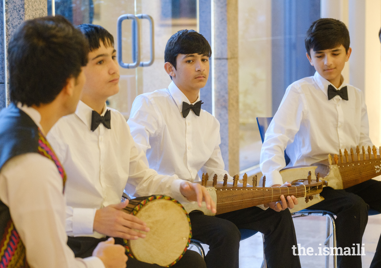 Young musicians perform traditional Afghan music at the Ismaili Centre Lisbon.