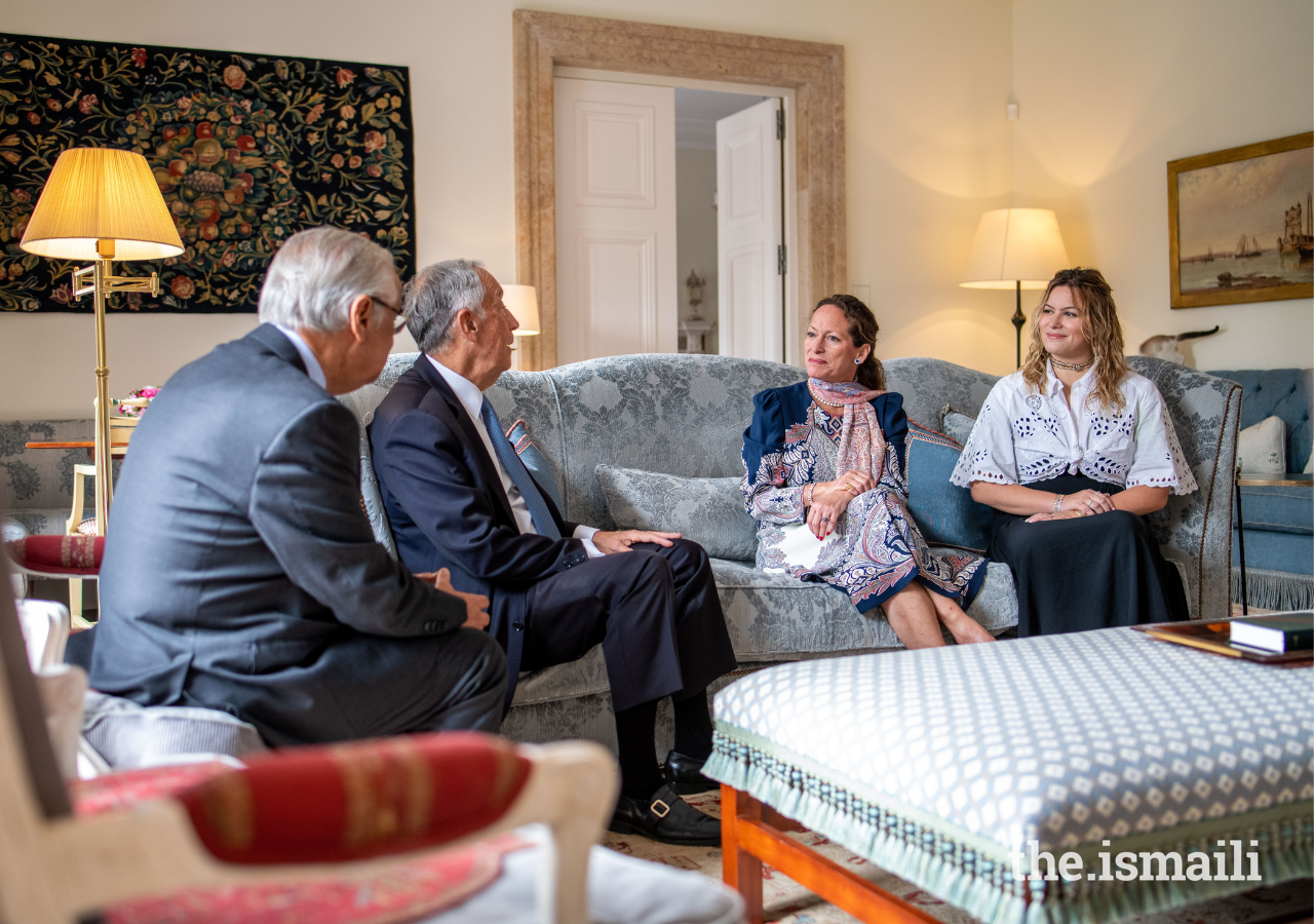 President Marcelo Rebelo de Sousa speaks with Princess Zahra, as Miss Sara Boyden and Nazim Ahmad, Diplomatic Representative of the Ismaili Imamat in Portugal, look on.