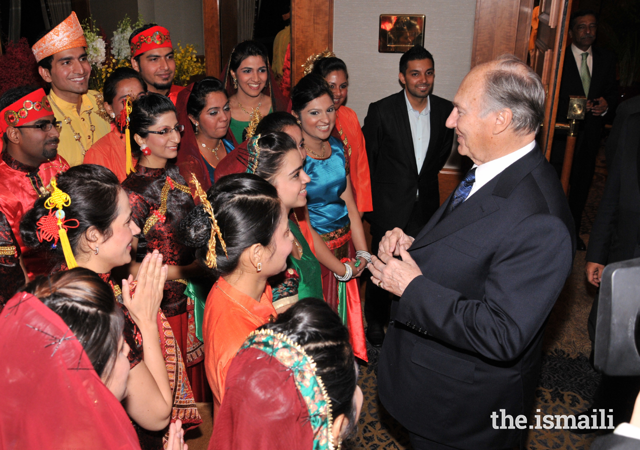  Mawlana Hazar Imam meets with performers at a Jamati Institutional dinner in Singapore, during his visit to the Far East in 2012.