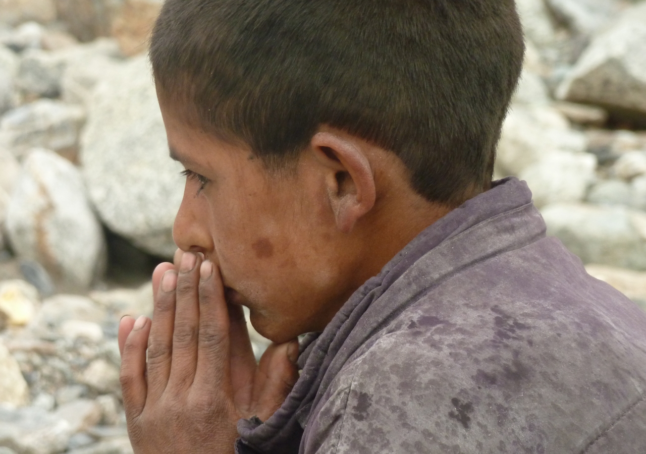 Life after the devastating floods — a boy lost in thought in Darkut, Gilgit-Baltistan.