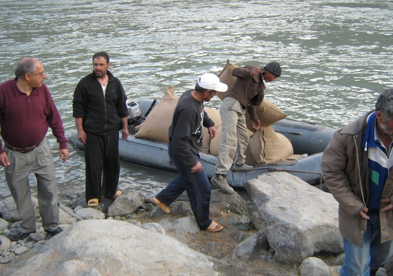 Nashir Karmali (left) with the FOCUS team crossing food aid into Afghanistan.