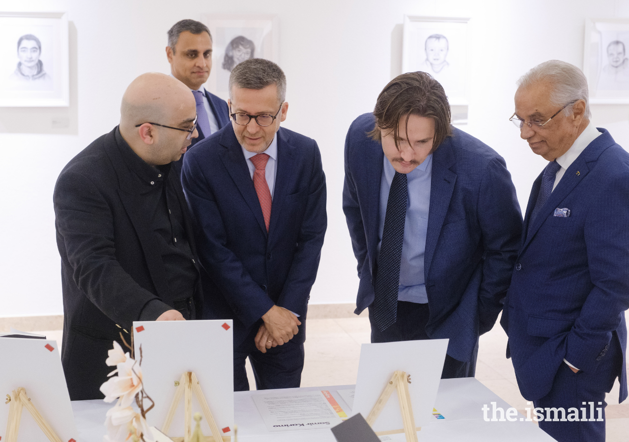 Prince Aly Muhammad and the Mayor of Lisbon, Dr Carlos Moedas, examine works of art in the ElevArte exhibition at the Ismaili Centre Lisbon.