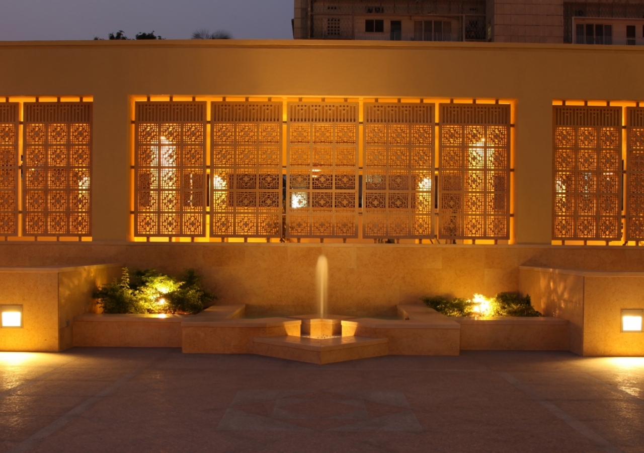 Enclosed by panels of limestone trellis, the Grand Courtyard of the Ismaili Jamatkhana and Centre, Kinshasa is a delight for the senses