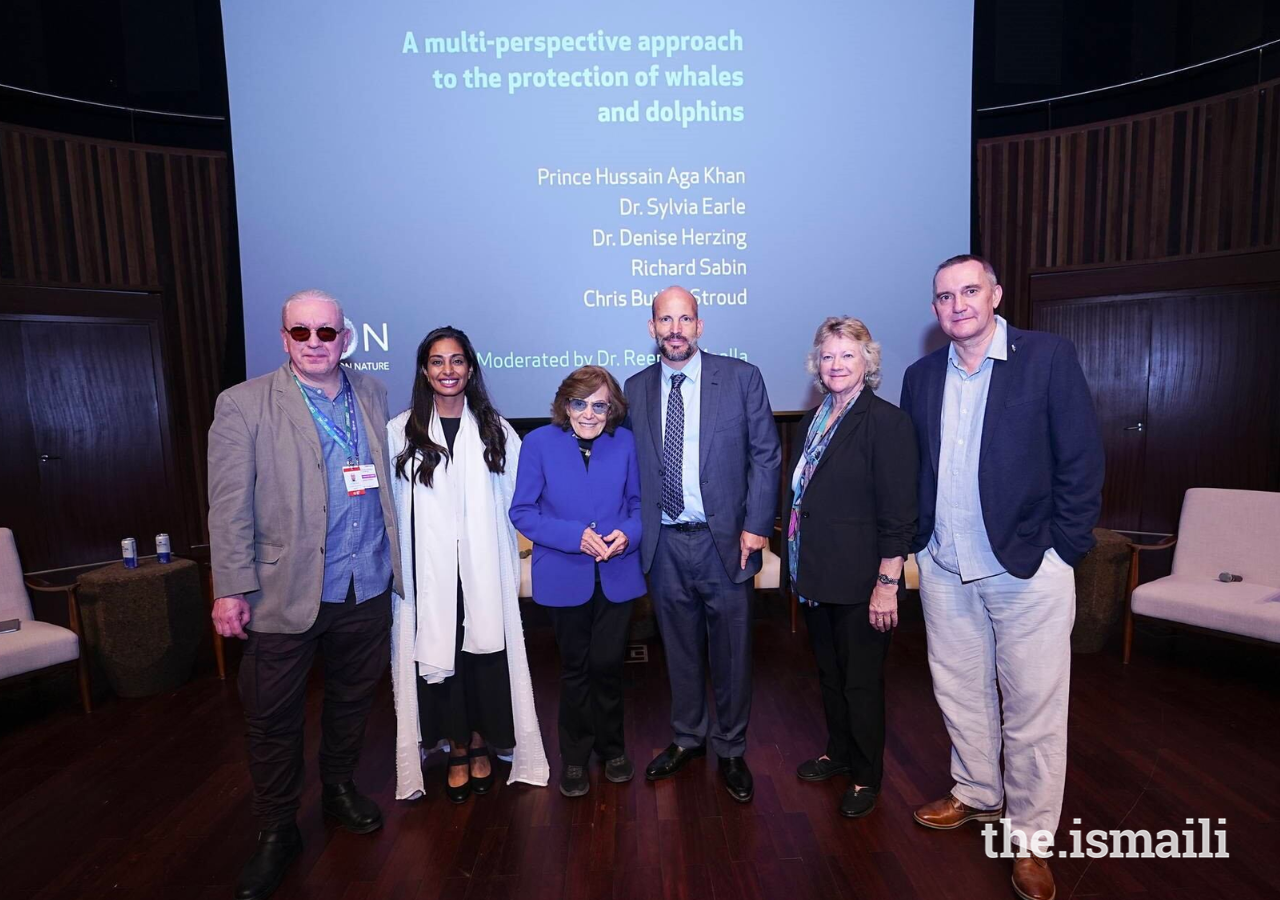 Prince Hussain and Dr Silvia Earle join a group photograph with fellow panellists.