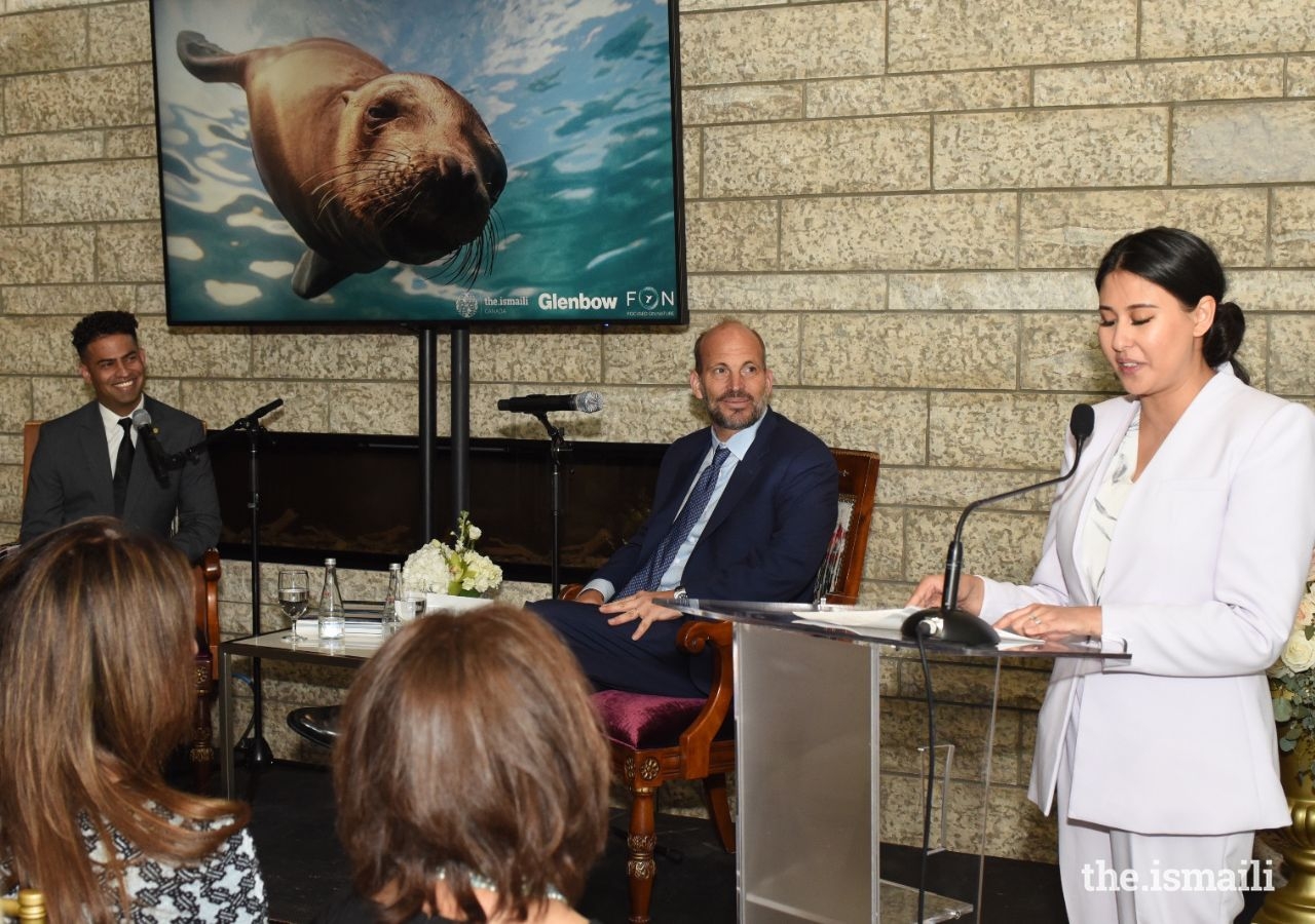 Emcee Leena Farzi Moulai jokes with Prince Hussain and Moderator Hussein Charania