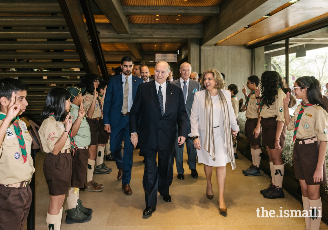 Mawlana Hazar Imam is accompanied by Isabel Mota, President of the Gulbenkian Foundation, as he is welcomed by Aga Khan Scouts upon arriving at the Aga Khan Music Awards Gala Concert and Prize-Giving Ceremony.