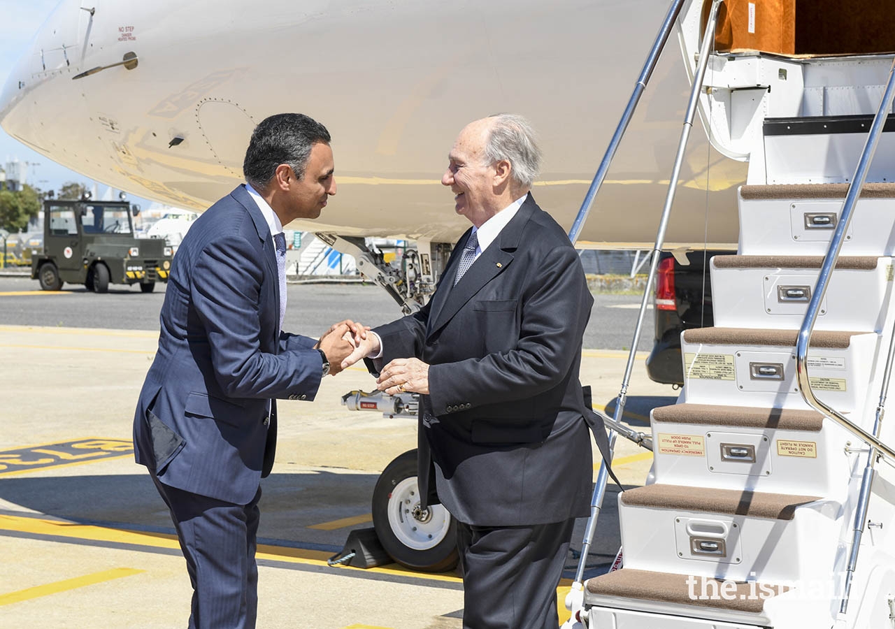 Mawlana Hazar Imam is greeted by Rahim Firozali, President of the Ismaili Council for Portugal.