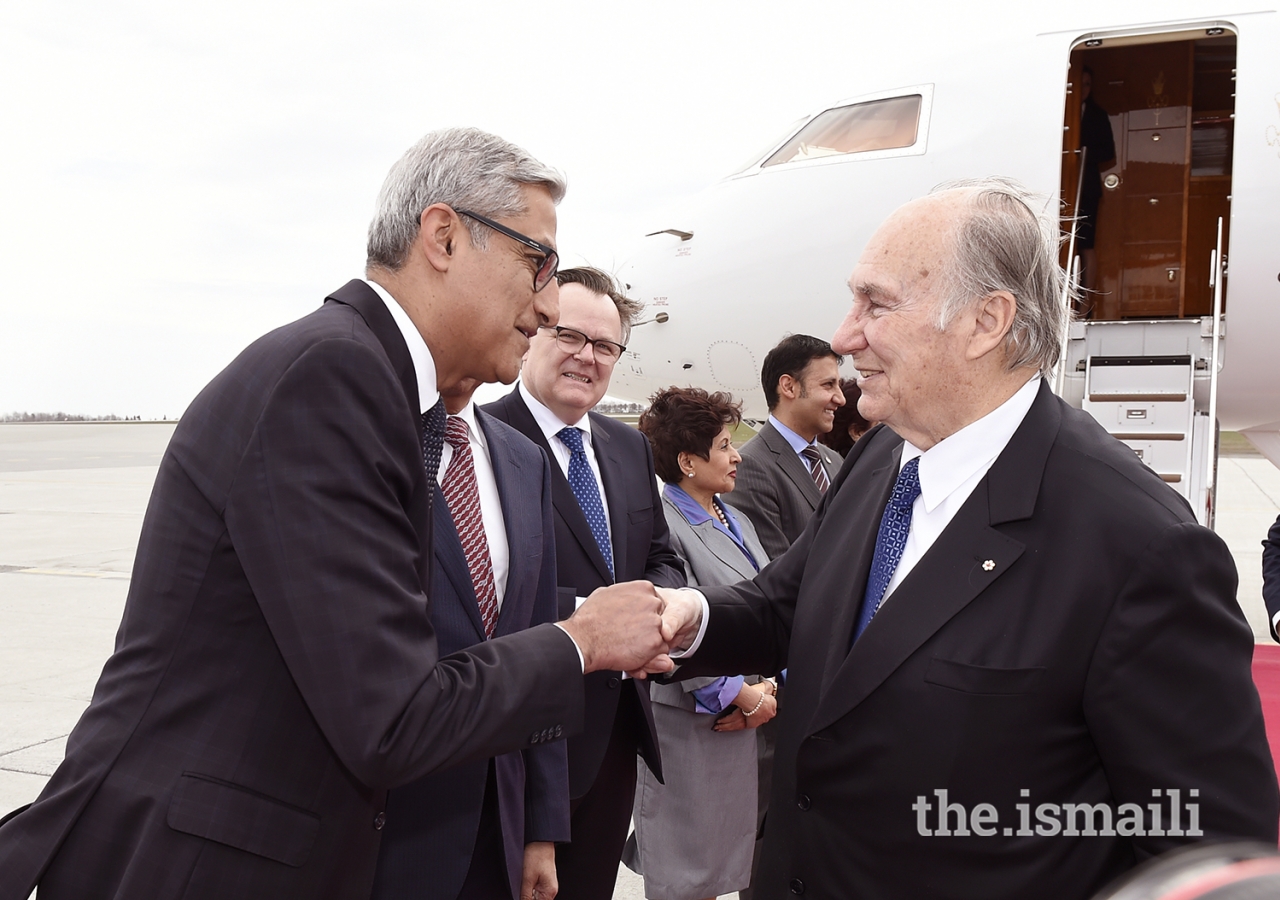 Mawlana Hazar Imam is received by Ismaili Council for Canada President Malik Talib upon his arrival in Ottawa.