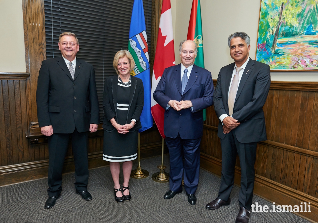Mawlana Hazar Imam and Alberta Premier Rachel Notley pose for a photograph with Mr. Lorne Dach, Member of Legislative Assembly, Edmonton-McLung, and Irfan Sabir, Minister of Community and Social Services.