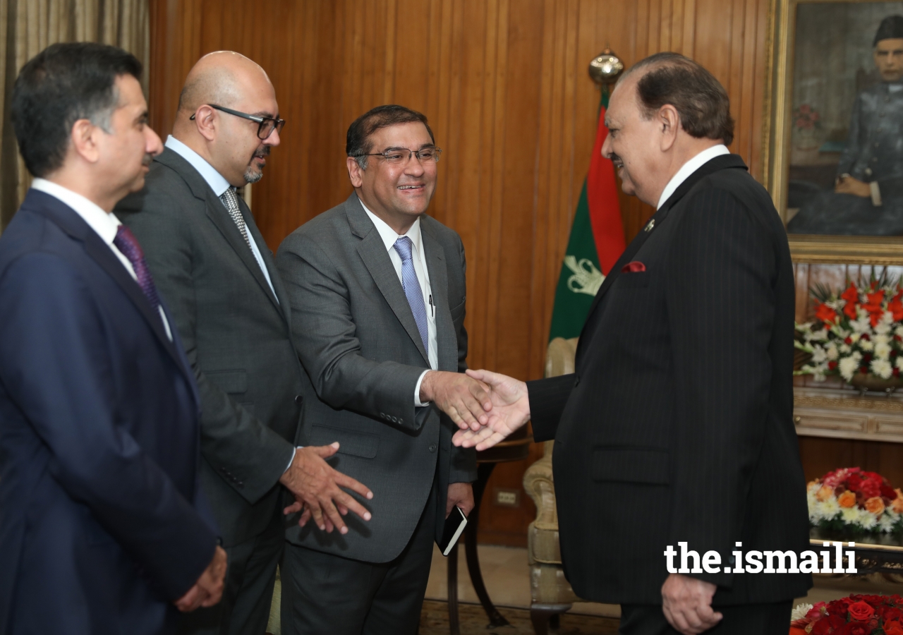 President Mamnoon Hussain greets Ismaili Council for Pakistan President Hafiz Sherali as Ambassador Arif Lalani, Head of the Diplomatic Department, Seat of the Ismaili Imamat, and Sultan Allana, Chairman, TPS & HBL look on