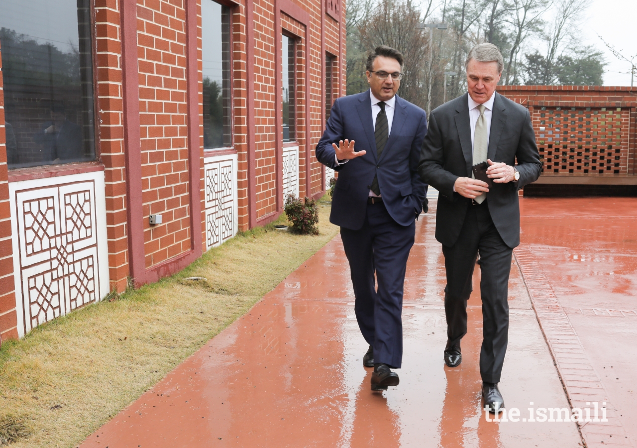 Murad Abdullah, President of the Ismaili Council for the Southeastern United States accompanies United States Senator for Georgia, David Perdue during his visit to the Ismaili Jamatkhana in Decatur, Georgia.
