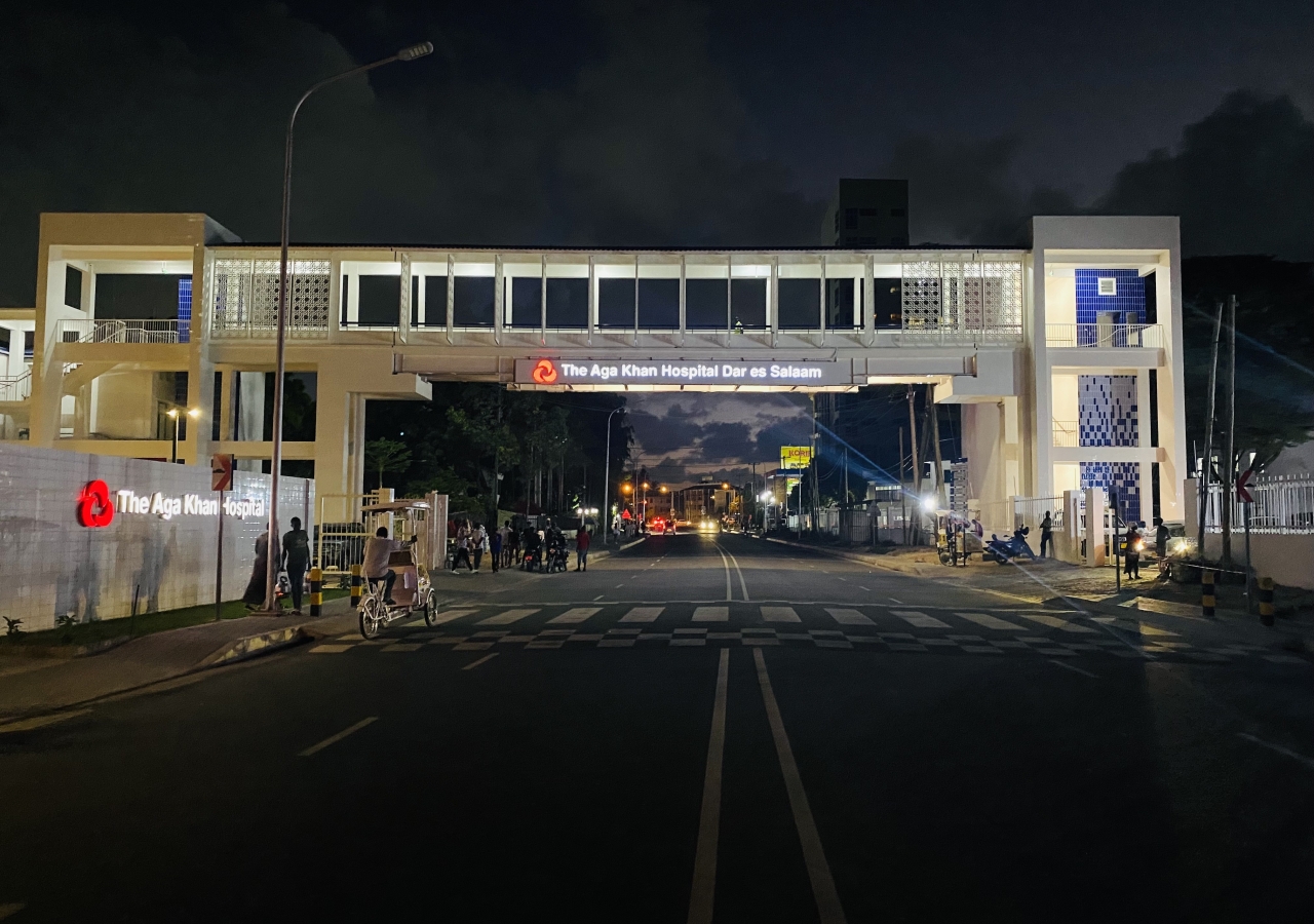 The new overhead pedestrian bridge at night. This overhead pedestrian bridge has been built to ensure the safety and security of the patients, their families, and employees of the Hospital.