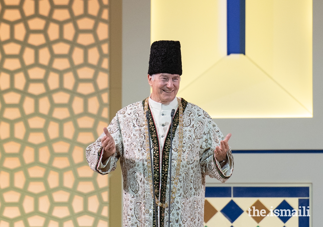 Mawlana Hazar Imam shares a light moment with the Jamat during the Diamond Jubilee Darbar in London.
