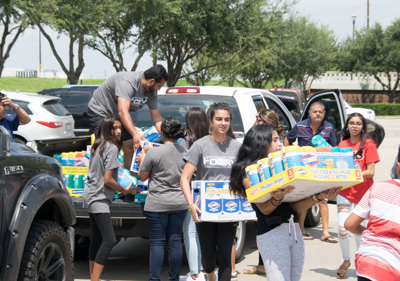 I-CERV volunteers unloading supplies at Catholic Charities of the Archdiocese of Galveston-Houston’s offices, as part of the Share Your Blessings drive.