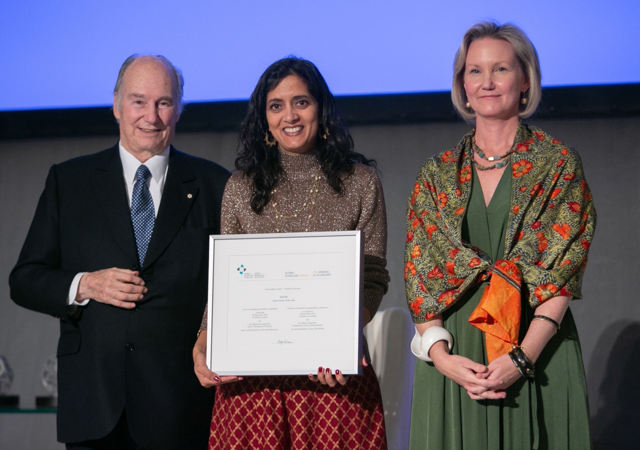 Waidehi Gokhale with Mawlana Hazar Imam and Meredith Preston McGhie, Secretary-General of the Global Centre for Pluralism (GCP), shown here receiving a 2019 Honorable Mention at the Global Pluralism Awards.