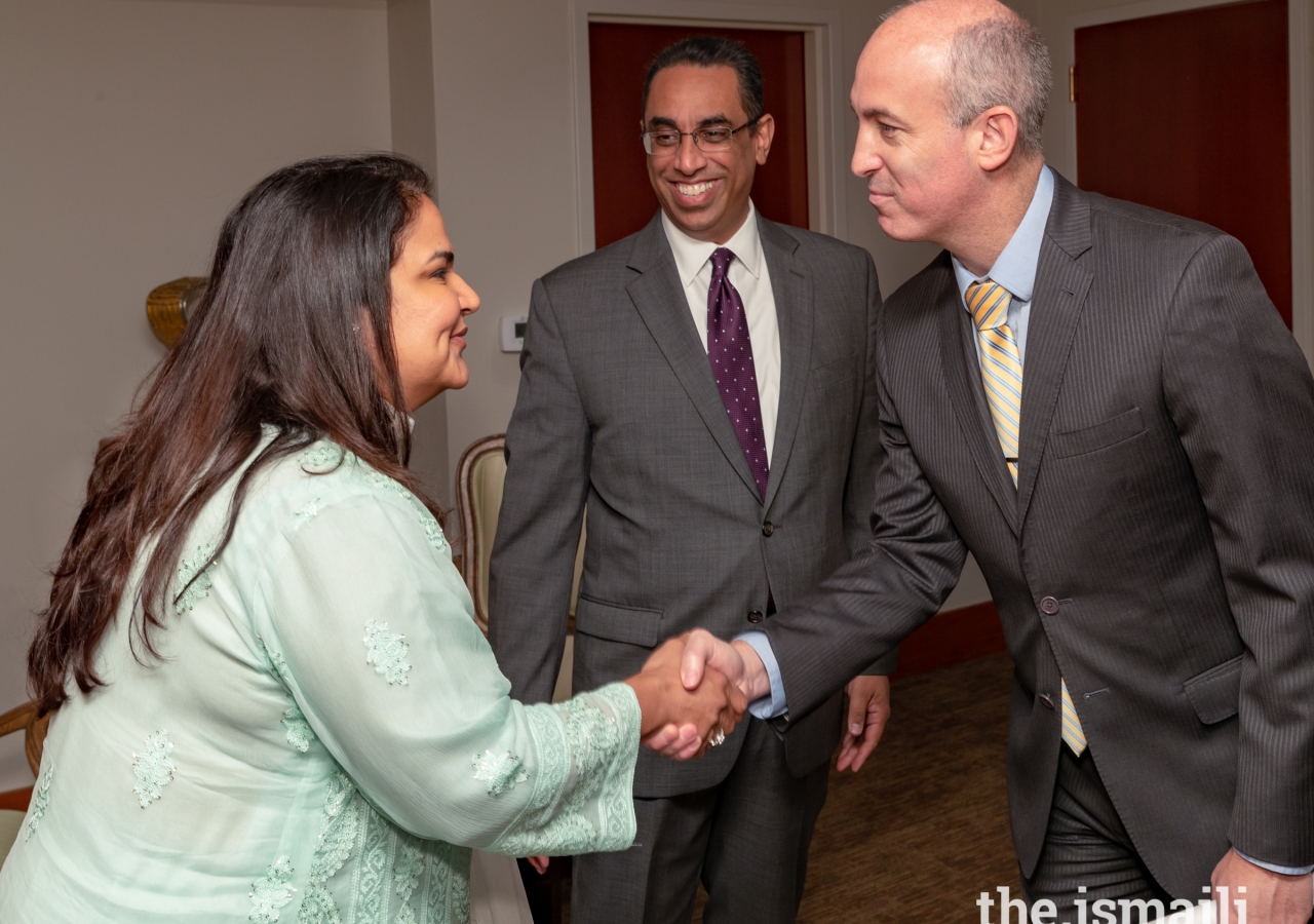 Ismaili Council leadership greeting guest at the Eid Luncheon. From left to right: Celina Shariff, Vice President, Aga Khan Council for USA; Al-Karim Alidina, President, Aga Khan Council for USA; Chris Olson, Director, Office of Trade and International Affairs, City of Houston.