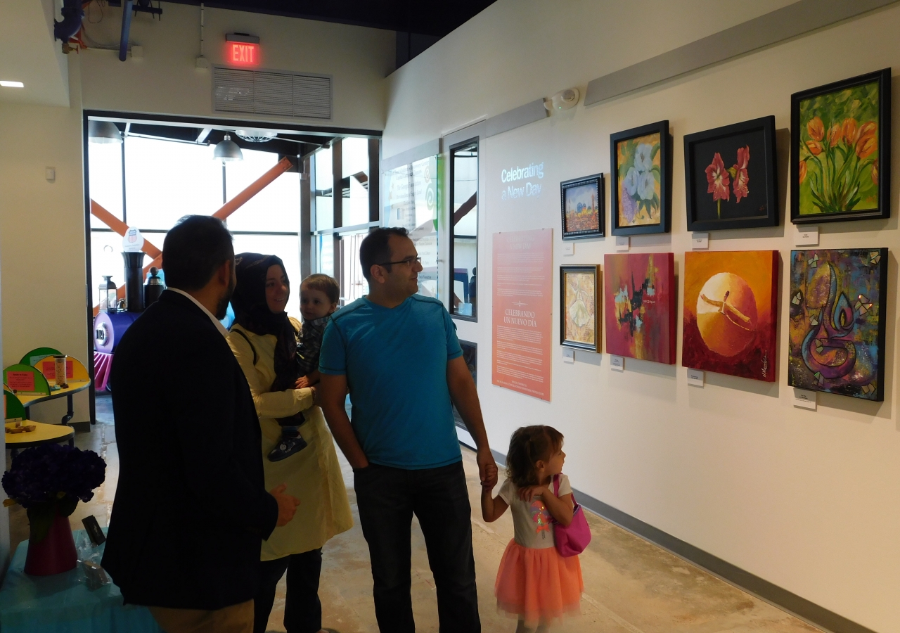Museum-goers enjoy “Celebrating a New Day” exhibition at the Fort Bend Children’s Discovery Center.