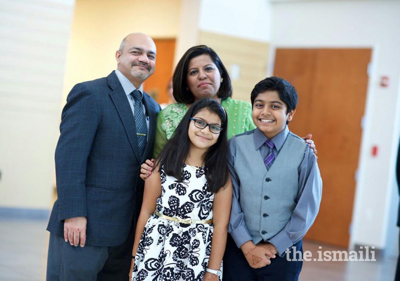Farzana Gajani, who became a cosmetologist with the help of the Quality of Life Skills Development Initiative, pictured here with her family.