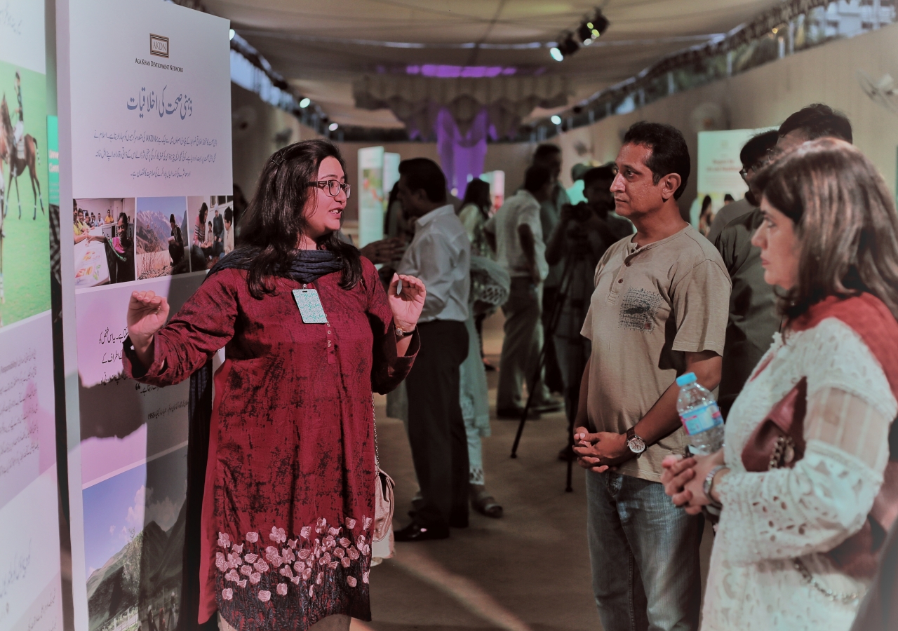A tour guide explains the Ethic of Sound Mind to exhibition visitors