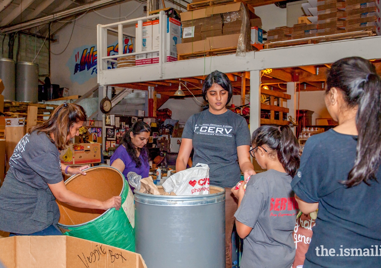 Volunteers sorting and boxing items at Westside Food Bank in Santa Monica.