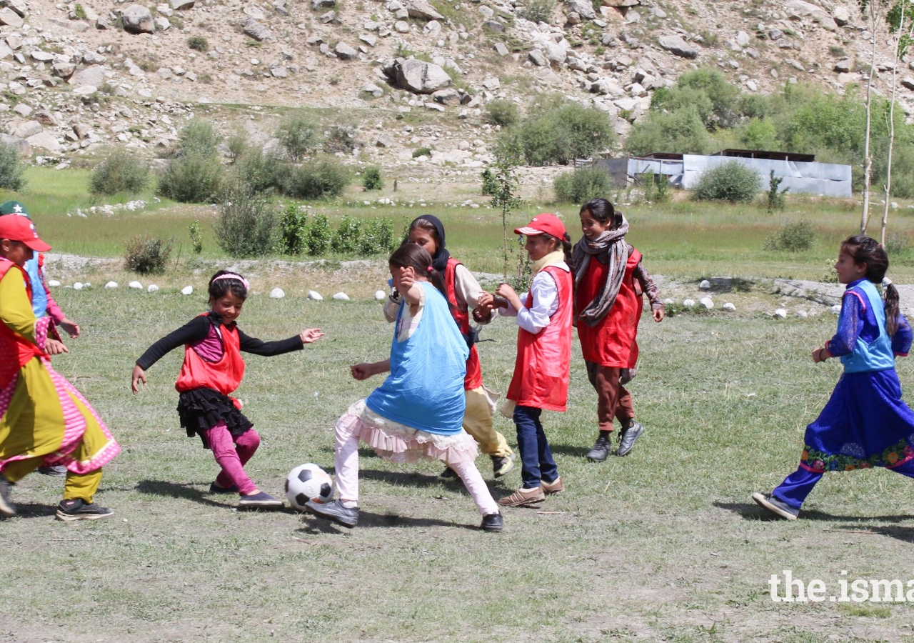 Girls of the Chitral Women’s Sports Club playing a soccer game.