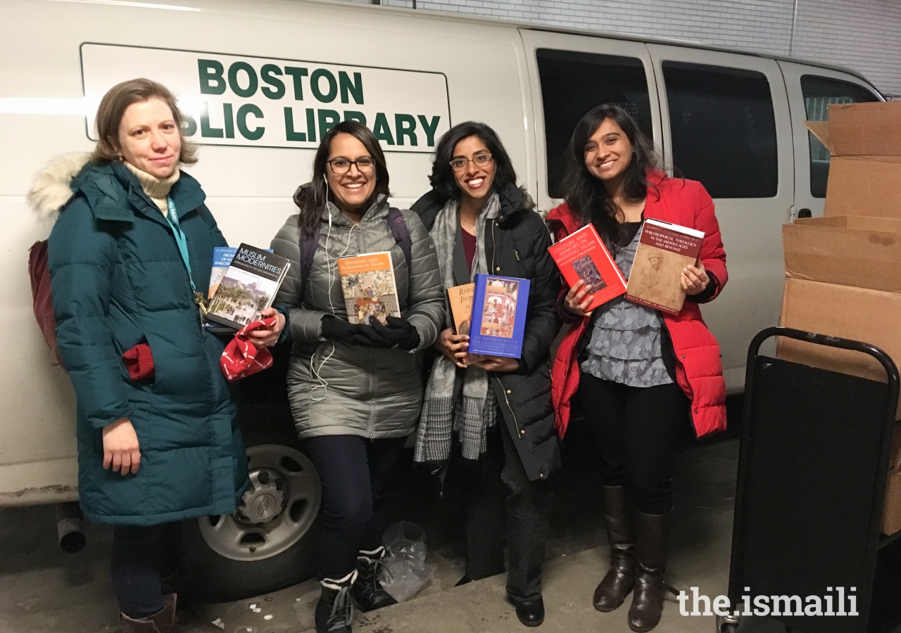 Delivering books to the Boston Public Library’s central branch. (Left to right): Melissa Andrews (Collection Development Manager at the Boston Public Library) and volunteers, Nashila Somani-Ladha, Alysha Alani, Afshaan Mazagonwalla.