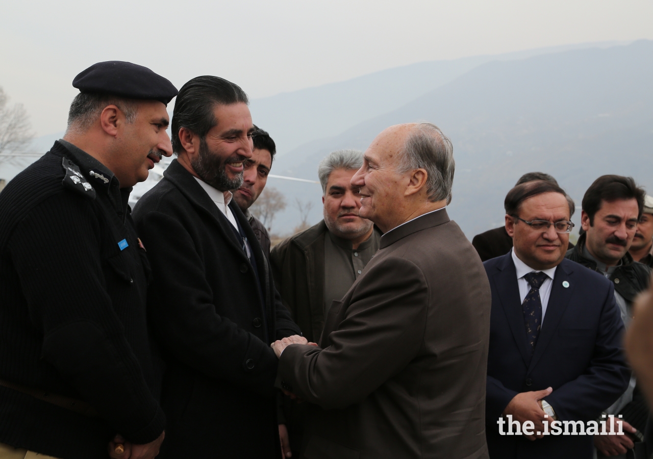Mawlana Hazar Imam is greeted by Magfirat Shah, District Nazim, Chitral upon his departure from the Chitral Town Airport 