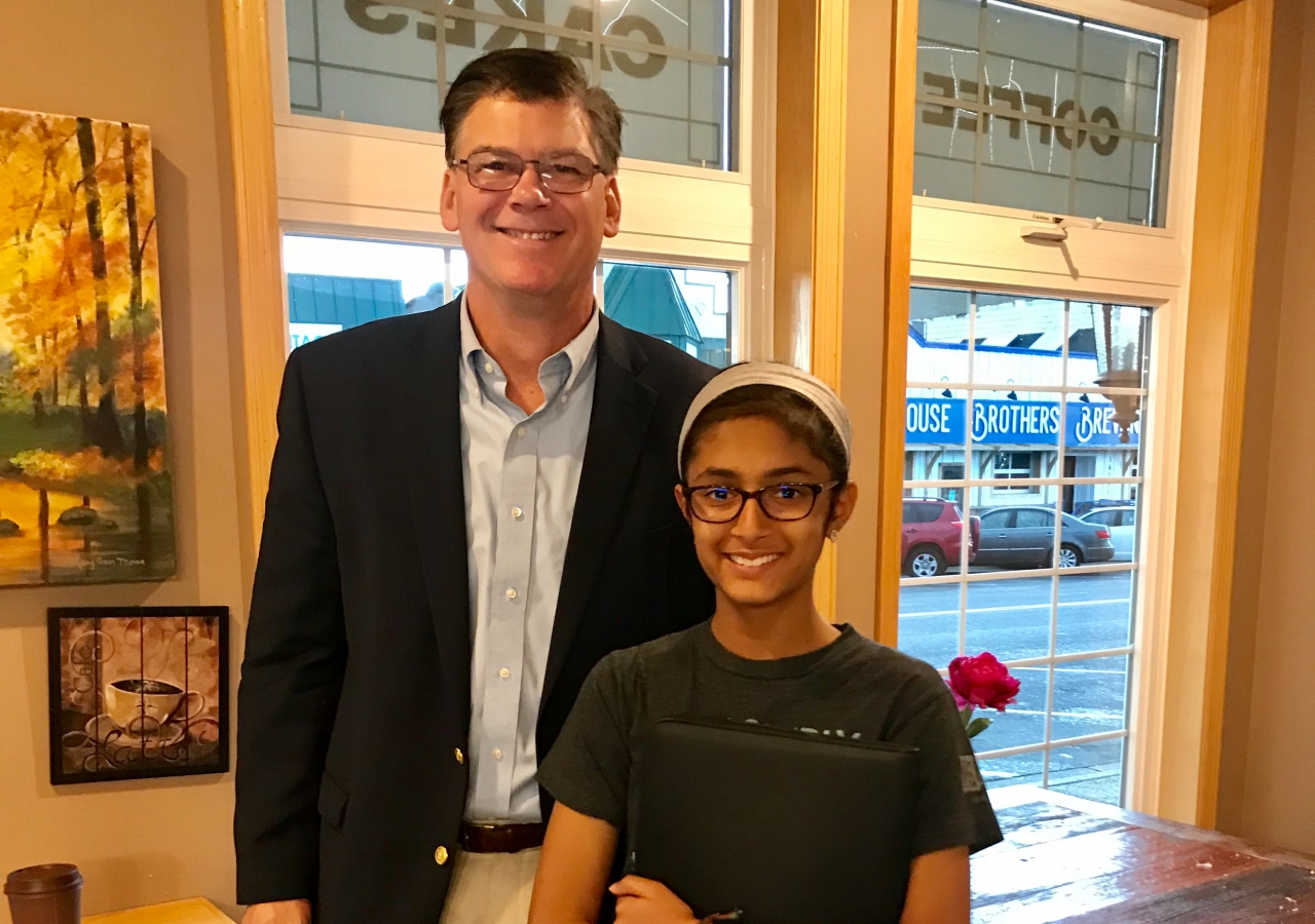 Senator Eric Pratt and Sanya at a local coffee shop after receiving a Kindness Compassion Service Proclamation.