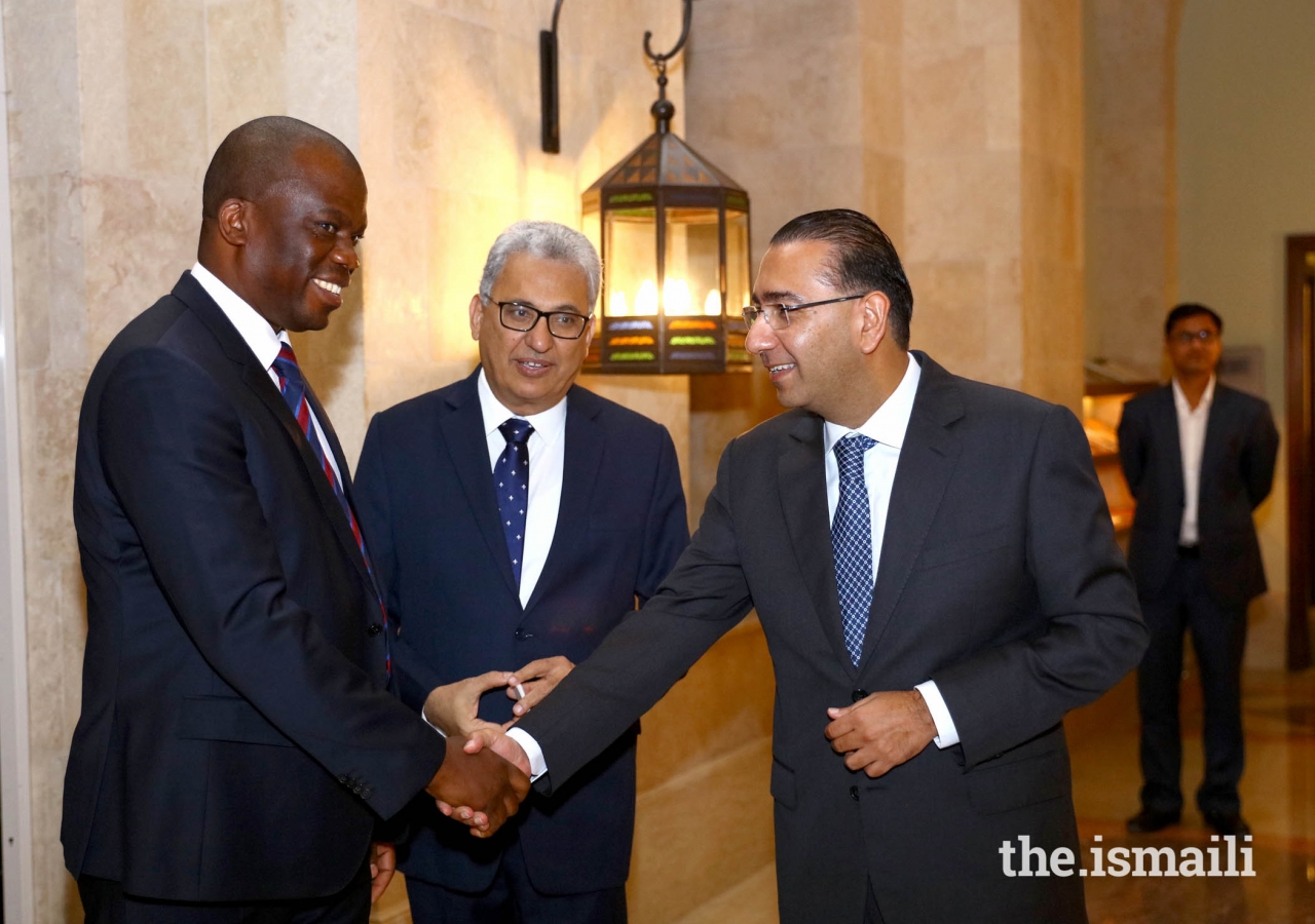 The South African Consul General, Mohobo David  Magabe being received by President of The Ismaili Community of United Arab Emirates, Amiruddin Thanawalla and Murtaza Hashwani