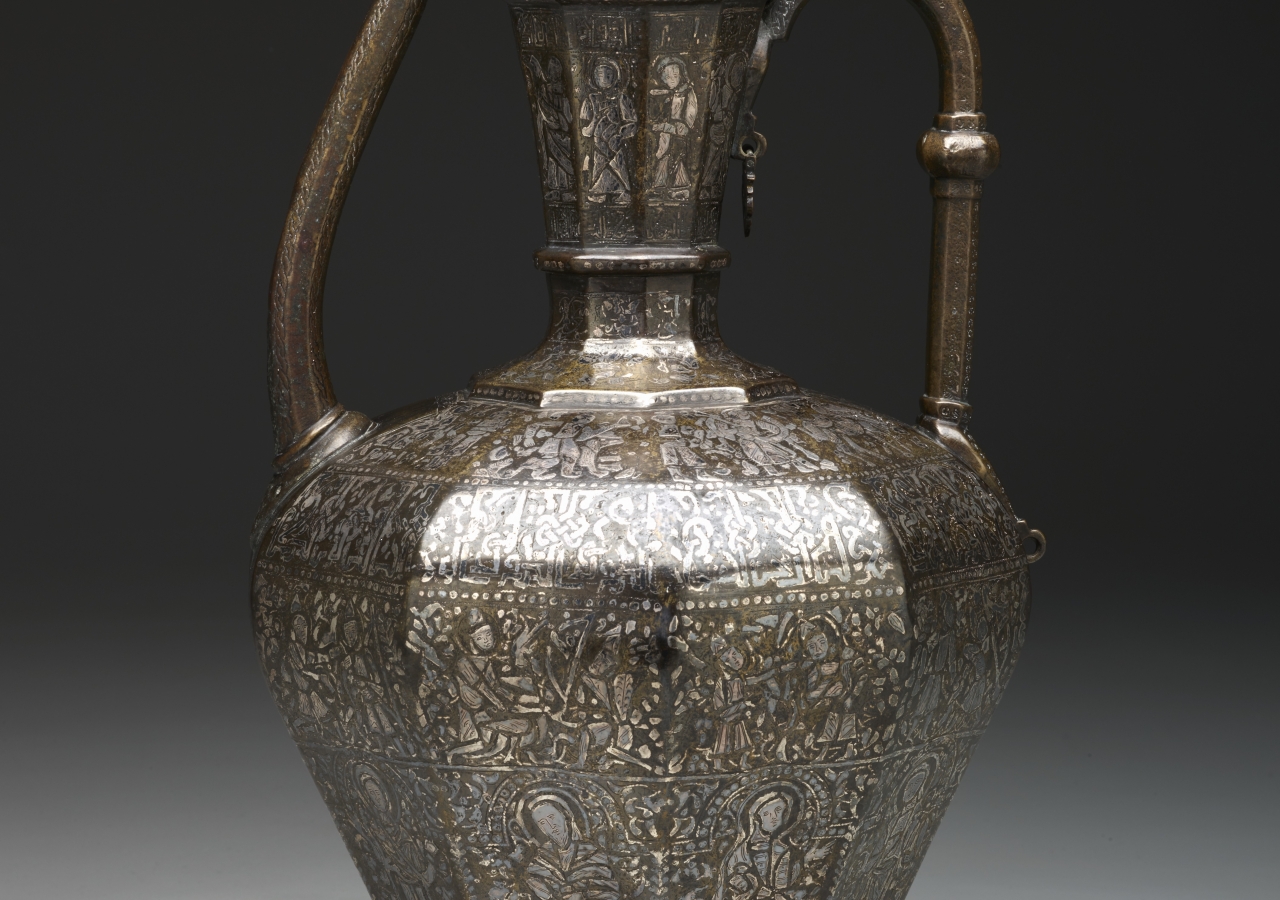Plate 2: The “Homberg Ewer”, brass inlaid with silver, dated 640 AH/1242 CE. Its rich decoration reflects the cultural mix of the Syrian region where it was made. 