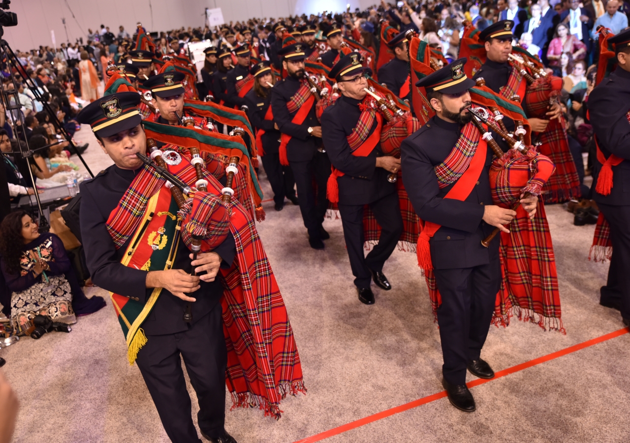 Sounds of the Southeast Pipe Band fill the hall during the One Jamat launch.
