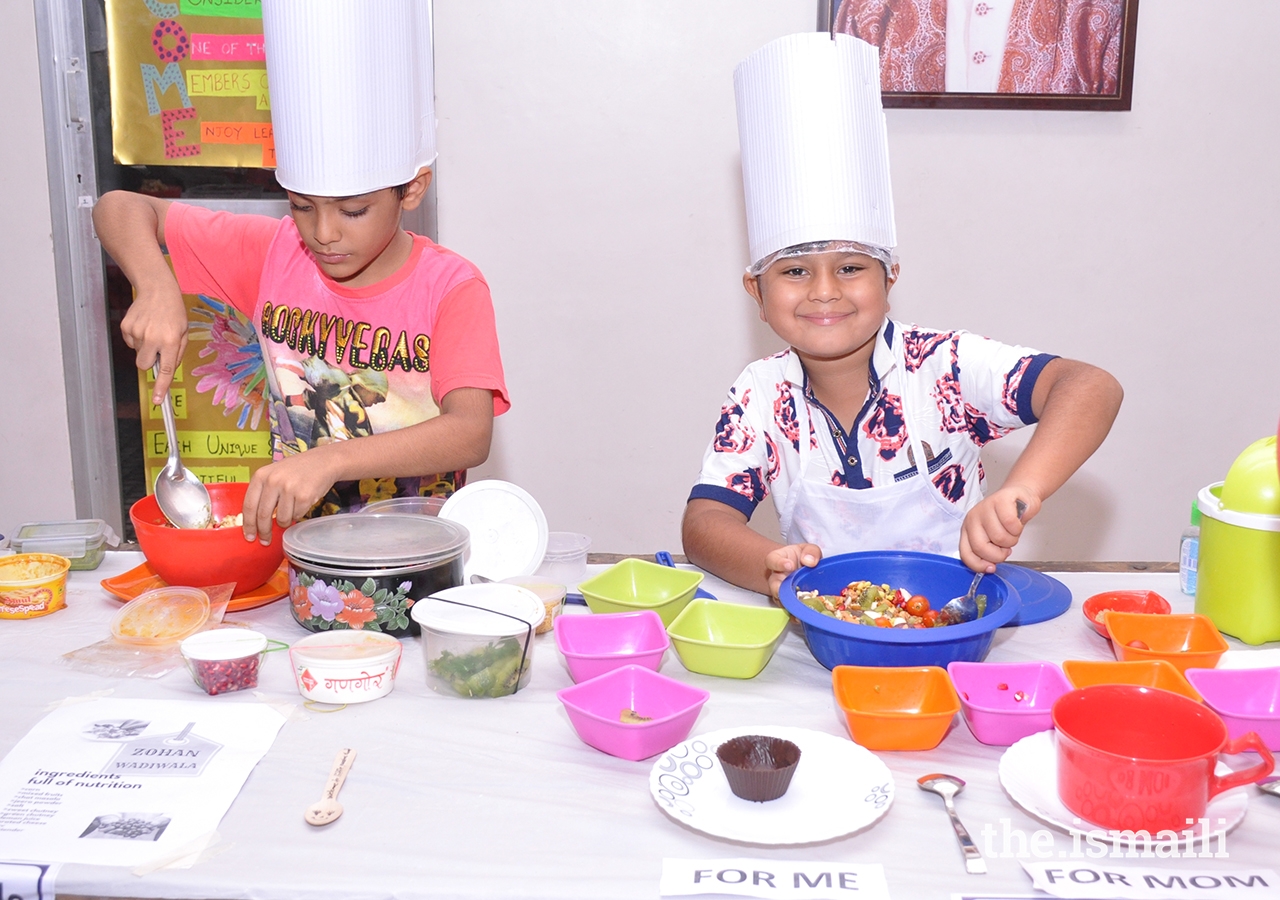 Children from the India Jamat participate in the Little Master Chef programme, which aims to help form healthy eating habits during the younger, impressionable years.