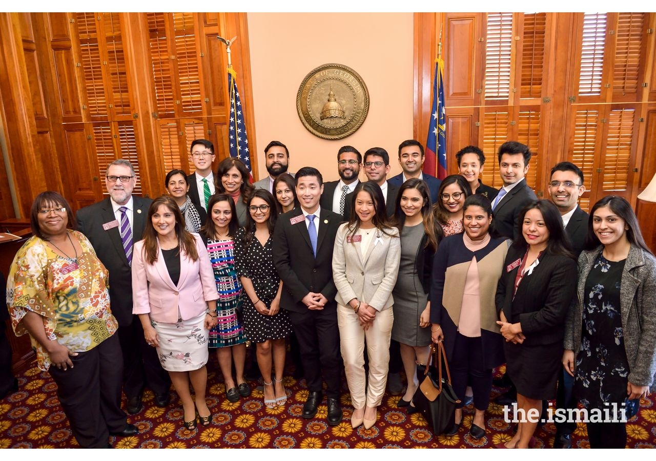 Rep. Sam Parks along with Reps. Bee Nguyen, Brenda Lopez, Pedro Marin, Valencia Stovall and others welcomed the Ismaili community to the House chamber, and invited their colleagues to tour the AKHCP exhibition in the lobby.