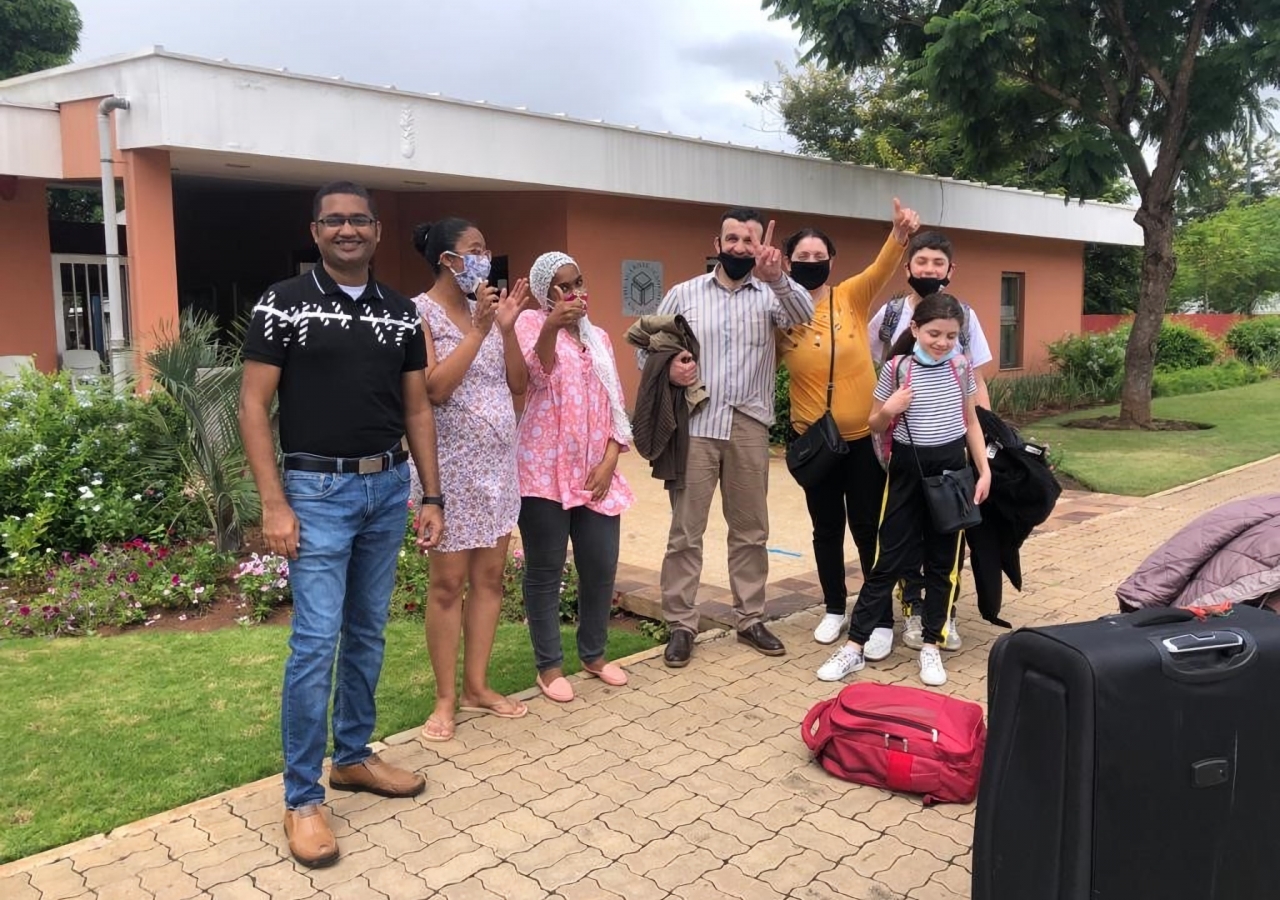 On arriving into Mozambique, Nuha, Wassim, and their two children are warmly welcomed by staff at the Aga Khan Academy, Maputo.