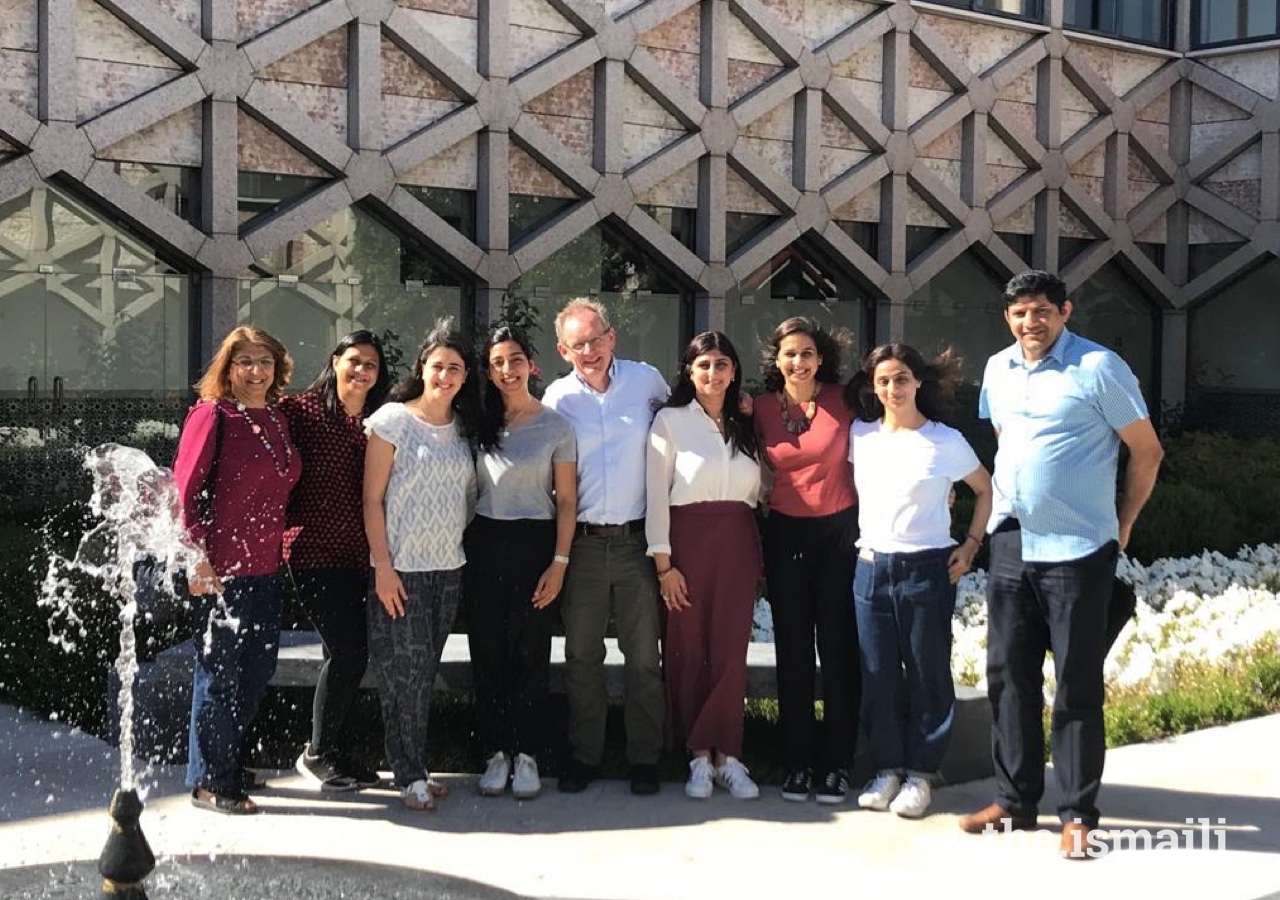 On the Parenting Journey organisers and participants gather for a group photo in the courtyard at the Ismaili Centre, Lisbon.
