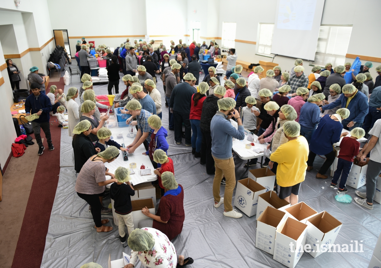 Over 400 jamati members and friends from the larger community volunteered to pack meals over 4 hours on the Day of Thanksgiving.
