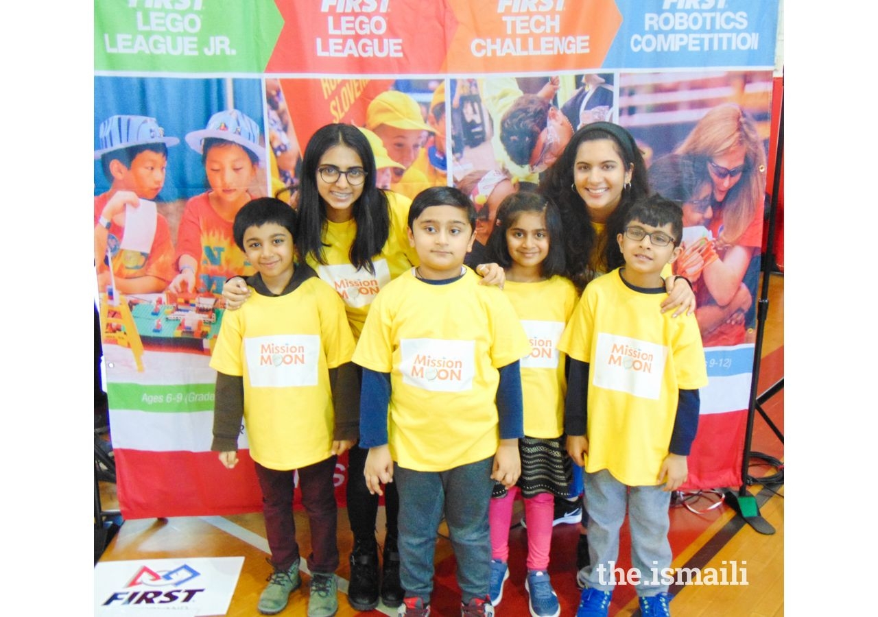 Team Lego Makers with their coaches Riya Panjwani, an undergraduate student at the Fashion Institute of Technology in Manhattan, and Kiran Bhimani, a recent graduate from New York University working as a Software Developer for Citi Bank. 