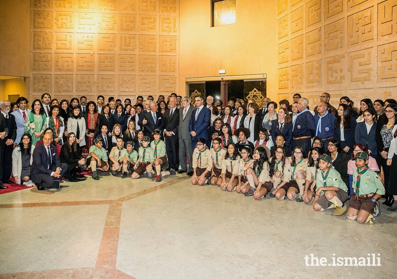 President of the Portuguese Republic, Marcelo Rebelo de Sousa, joins leaders of the Jamat and AKDN, volunteers, and Aga Khan Scouts for a group photograph.